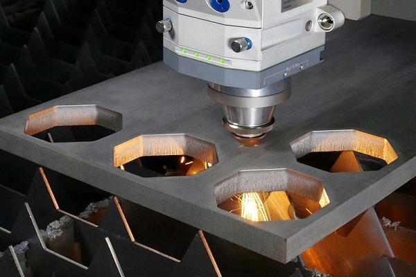 Laser Cutting hexagonal holes.jpg